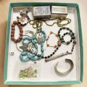 A group of costume jewellery, simulated turquoise necklace, a silver pencil,