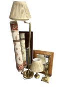 A modern brass standard lamp, two table lamps, two mirrors and a machine made rug.