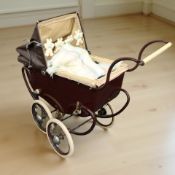A doll's pram.