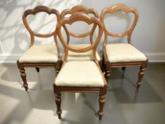 A set of four Victorian mahogany dining chairs.