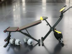 An Everlast folding exercise bike, together with a folding exercise bench and two dumbbells.