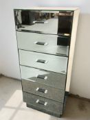 A contemporary mirrored six drawer chest, 51 cm x 41 cm x 118 cm.