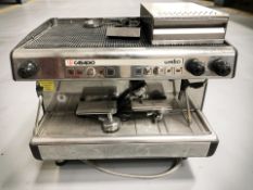 A Casadio Undici stainless steel commercial coffee maker.