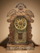 A late 19th century American Ansonia Clock Company gingerbread clock,