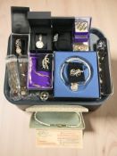 A quantity of costume jewellery including various decorative pendants, cultured pearls,