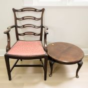 A Georgian style mahogany ladder back armchair and a burr walnut circular low coffee table.