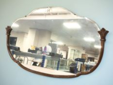 A walnut framed bevelled Art Deco mirror, width 80 cm.