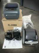 A Zebra GK420D label maker and a Dymo label maker.