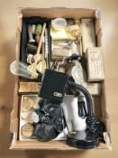 A group of vintage medical instruments, a Kodak Brownie Flash II camera flash, etc.