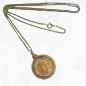 A George V gold half sovereign mounted as a pendant in 9ct gold suspended on a Continental necklace