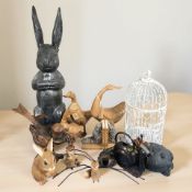 A group of contemporary animal ornaments, bookends, bird cage,