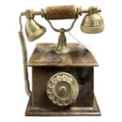 An onyx and gilt metal telephone.