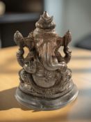 An Indian carved hardwood figure of Ganesh, height 29 cm.