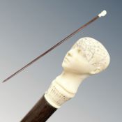 An Edwardian Gentleman's walking cane with silver mounted ivory phrenology head dated Chester 1909,