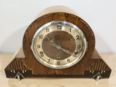 An Art Deco inlaid walnut eight day mantel clock, width 37 cm.