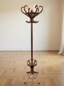 A reproduction stained bentwood hat and coat stand, height 196 cm.