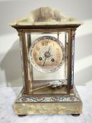 An early 20th century onyx mantel clock with champleve enamel decoration,
