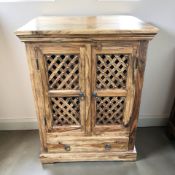 A sheesham wood cabinet with pair of lattice doors and drawer beneath, 73 cm x 51 cm x 97 cm.