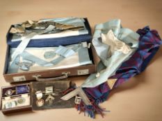 A leather case of masonic and RAOB ephemera including two silver gilt medals,