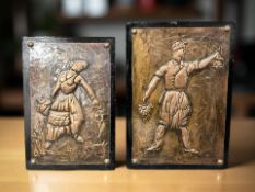 Two Cypriot copper and wood panels depicting figures carrying wine, largest 17 cm x 24 cm.