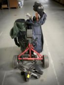 Two golf bags, one containing Acer irons and drivers, together with a Poua Caddy golf caddy.