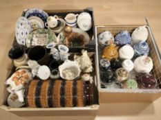 A West German pottery stick pot, together with assorted porcelain caddies, figurines,