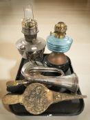 A chrome oil lamp, further oil lamp with blue glass reservoir,