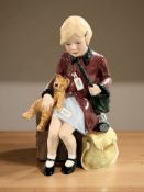 A Royal Doulton figure 'The Girl Evacuee' HN3203, limited edition No. 4115 of 9500.