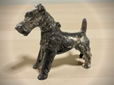 A silver-plated table lighter in the form of a scottie dog, height 13.5 cm.