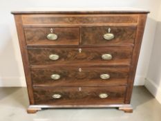 A George III mahogany pine and satinwood inlaid five drawer chest on bracket feet,