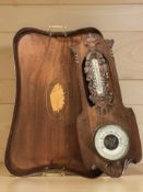 An inlaid mahogany twin-handled serving tray,