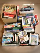 A large quantity of board games and jigsaws.