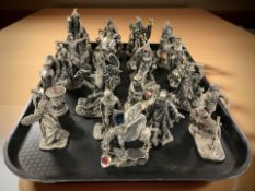 A collection of cast pewter fantasy figurines.