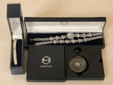 A Brooks & Bentley footprints bracelet, a lady's Philip Mercier wristwatch and matching bracelet,