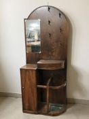 An early 20th century oak hall stand,