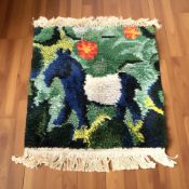 A 1970's shaggy piled rug depicting a horse, 115 cm x 97 cm.