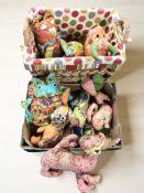 A wicker basket on wheels and a further box containing assorted fabric animal ornaments.