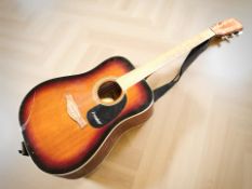 A Westfield acoustic guitar,