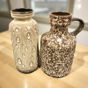 A West German pottery jug and a similar vase,