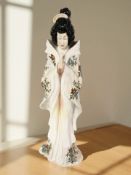 A Michael Sutty porcelain figure of a geisha, height 29 cm.