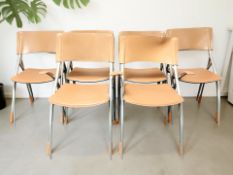 A set of six Italian Calligaris folding chairs,