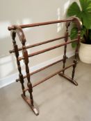 A reproduction towel rail,