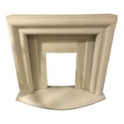 A composition stone effect fire surround, approximately 120 cm W x 30 cm D x 110 cm H.