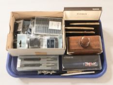 A quantity of pen ink cartridges, various pens including Parker, desk blotter, etc.