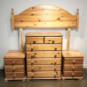 A contemporary pine seven drawer chest,