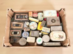 A group of vintage tins,