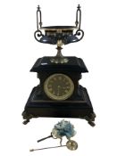 A black slate and gilt metal mounted eight day mantel clock signed 'John Bennett, London',