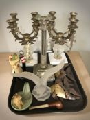 A pair of ornate gilt metal candelabra, an EPNS corinthian column candlestick, metal fish ornaments,