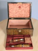 A Victorian walnut parquetry inlaid jewellery box, together with a pipe.