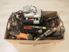 A group of power tools, compressor, sander, Black & Decker drill,